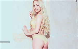 English actress and model, Jorgie Porter - known for blonde killer looks